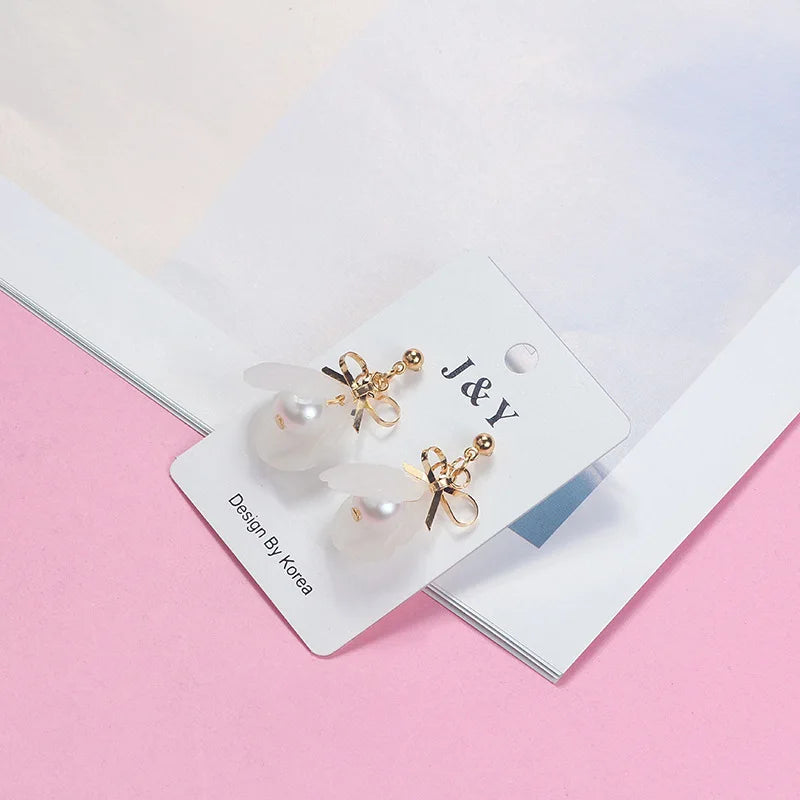 Nadel Soft Shell Weiße Blume Knospe Ohrringe Transparente Perle Blume Quaste Ohrringe Legierung Persönlichkeit Stil Sommer Mode