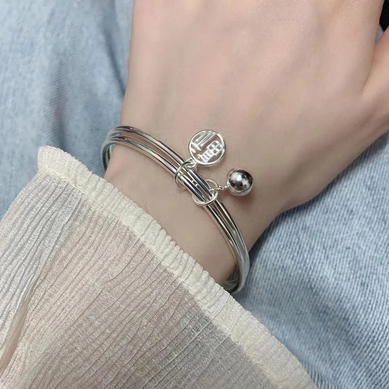 Mode viel Glück Doppels chicht Fu Glocke Armband Silber Farbe Trend elegante Anhänger Armreifen für Frauen