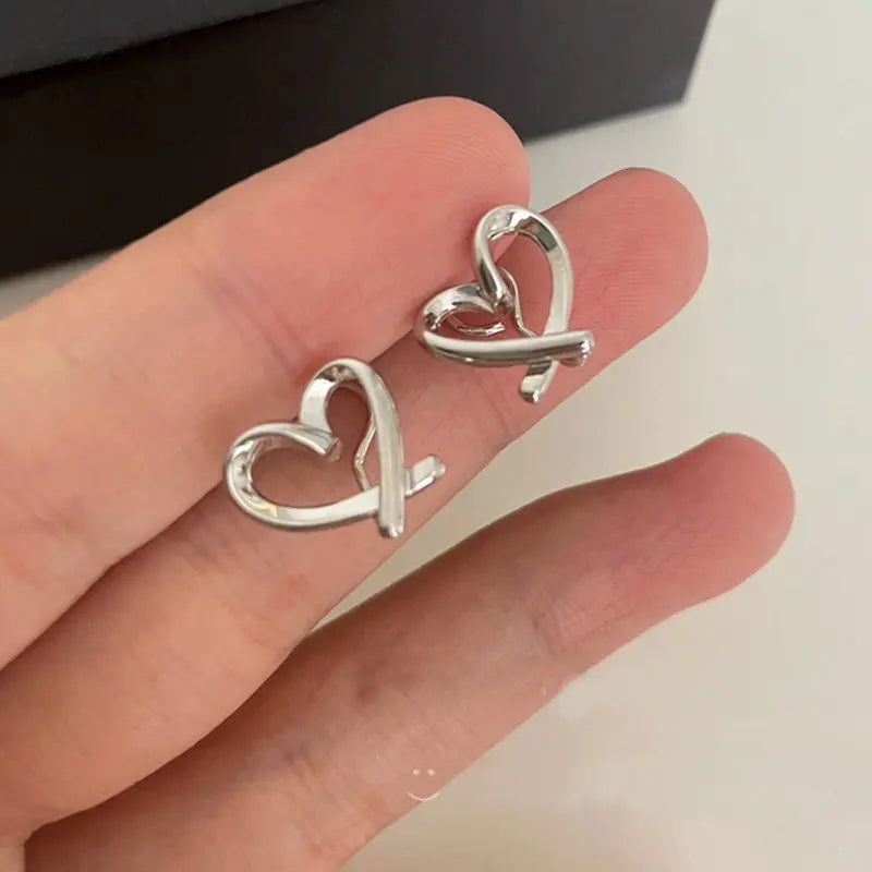 Mode Unregelmäßige Hohle Herz Clip Ohrringe Für Frauen Mädchen Nicht-Piercing Silikon Ohr Clips Minimalistischen Stud Ohrring Schmuck