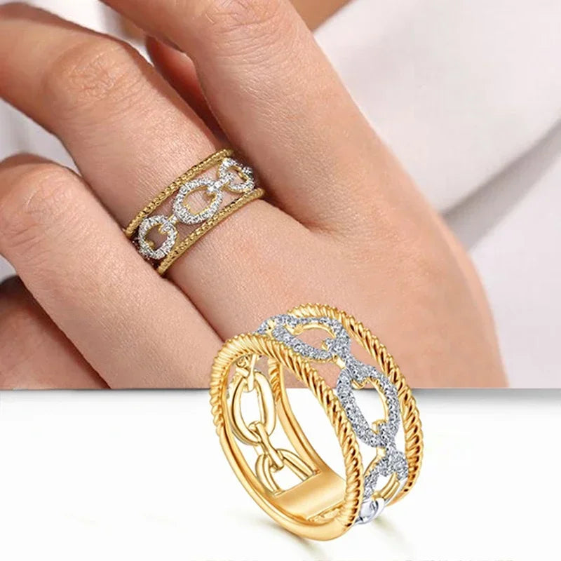 Huitan Luxuriöse Ringe mit zweifarbigem Design, wunderschönes ausgehöhltes Fingerzubehör für Frauen, zarter Schmuck für Verlobungsfeier