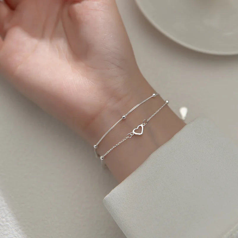 Silbernes doppellagiges Liebesherz-Armband mit hohlen runden Perlen für Frauen und Mädchen, modischer romantischer Schmuck, klassische verstellbare Geschenke