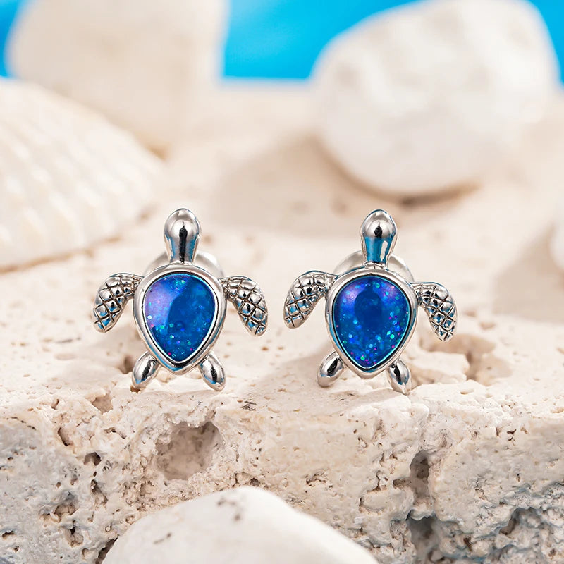 Huitan Blaue kleine Schildkröten-Ohrstecker für Damen, schickes Tier-Accessoire für den Alltag, zierlicher silberfarbener Schmuck für Damen