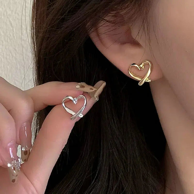 Mode Unregelmäßige Hohle Herz Clip Ohrringe Für Frauen Mädchen Nicht-Piercing Silikon Ohr Clips Minimalistischen Stud Ohrring Schmuck