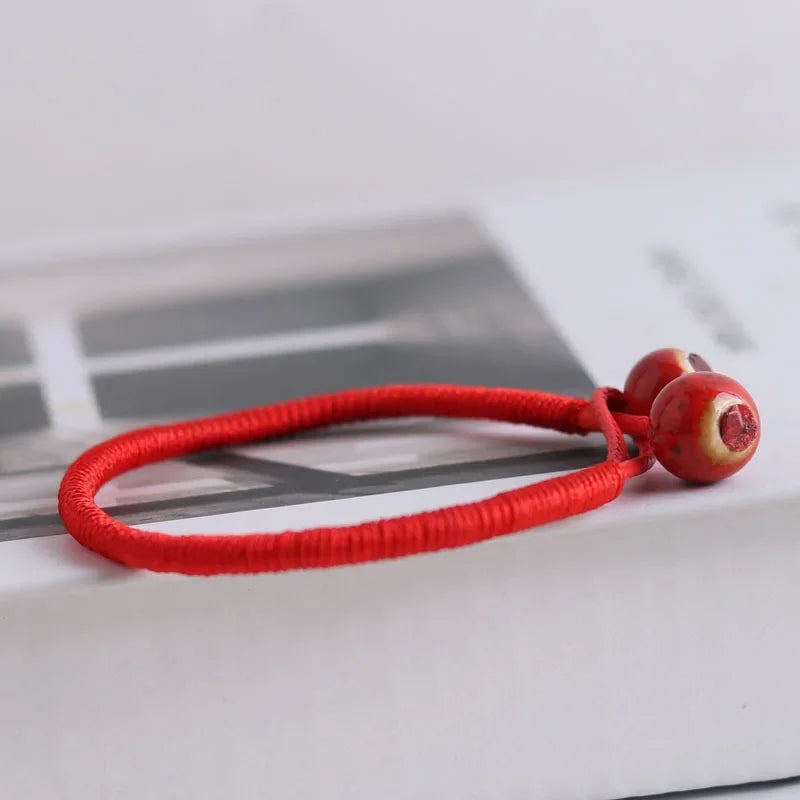 Tibetisch-buddhistische Glücksbringer-Keramik-rote Perlenarmbänder, Armreifen für Frauen, handgefertigte Knoten, Faden, Schnur, Seil, Armbänder, Schmuck