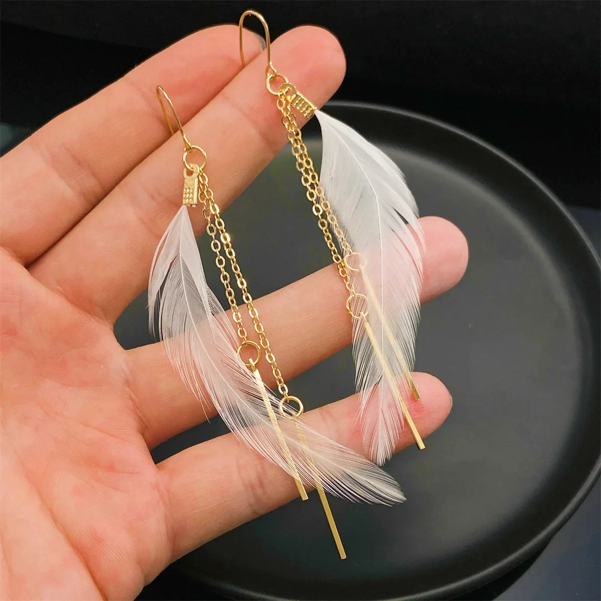 Neue europäische und amerikanische Retro-Mode kreatives Design Feder ohrringe exquisite Quasten ohrringe als Schmuck geschenk für Freunde