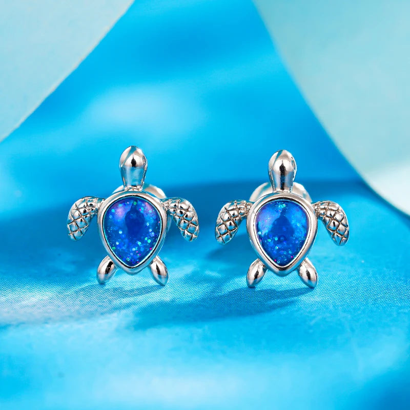 Huitan Blaue kleine Schildkröten-Ohrstecker für Damen, schickes Tier-Accessoire für den Alltag, zierlicher silberfarbener Schmuck für Damen