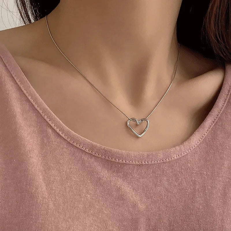 Anenjery 316l Edelstahl hohle verzerrte Herz Halskette Ohrringe für Frauen einfache Mode Schmuck Set Großhandel