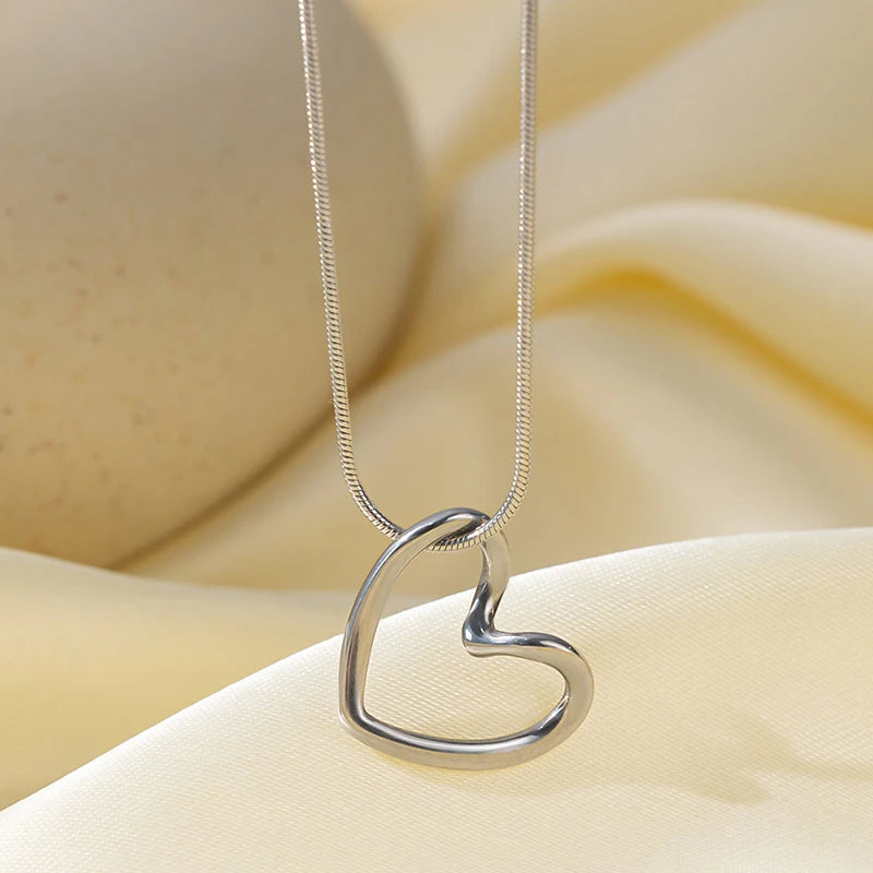 Anenjery 316l Edelstahl hohle verzerrte Herz Halskette Ohrringe für Frauen einfache Mode Schmuck Set Großhandel