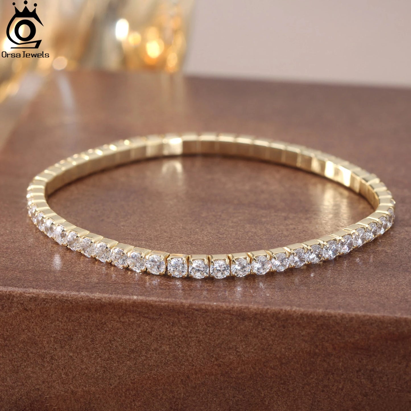 ORSA JEWELS 3 mm funkelndes 5A-Tenniskettenarmband mit kubischem Zirkonia, 925er Sterlingsilber, 14 Karat vergoldetes elastisches Seil, vorhanden SB217