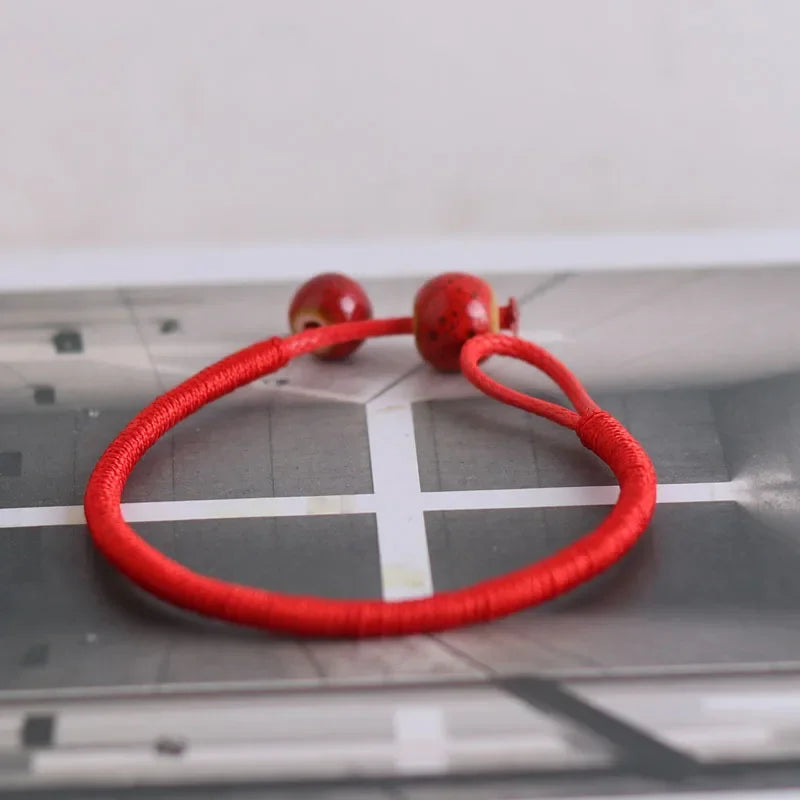 Tibetisch-buddhistische Glücksbringer-Keramik-rote Perlenarmbänder, Armreifen für Frauen, handgefertigte Knoten, Faden, Schnur, Seil, Armbänder, Schmuck