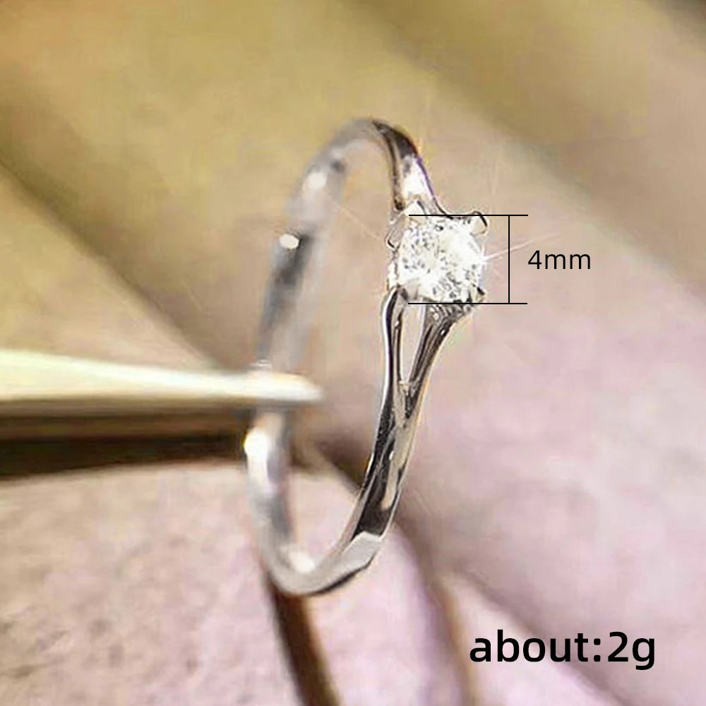 Huitan Minimalistische Damen-Eheringe mit 4 mm Zirkonia, schlicht, elegant, weibliches Finger-Zubehör, Verlobungsringe, Schmuck