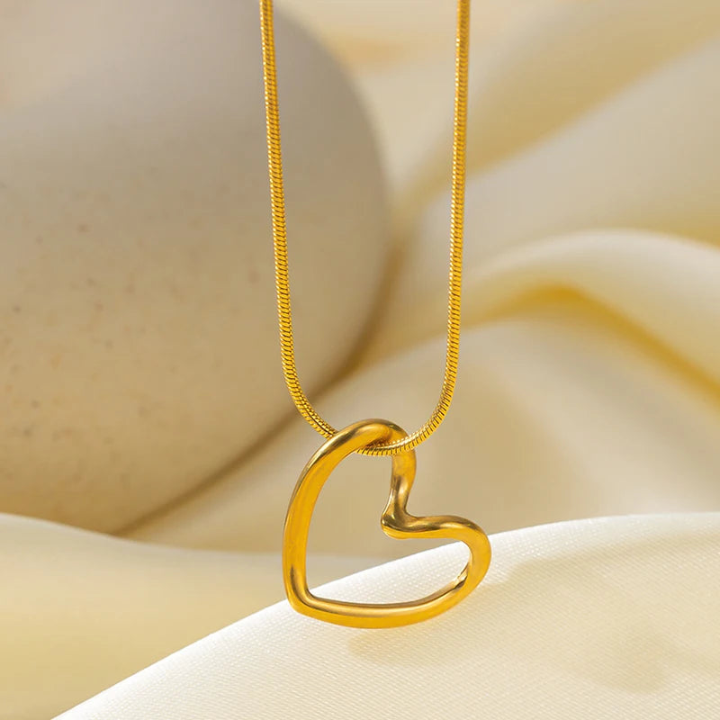 Anenjery 316l Edelstahl hohle verzerrte Herz Halskette Ohrringe für Frauen einfache Mode Schmuck Set Großhandel