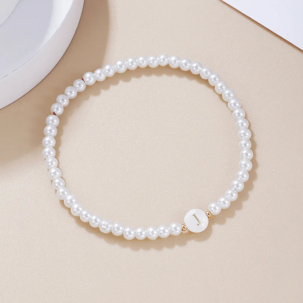 LATS Einfaches, vielseitiges 26-Buchstaben-Perlenarmband für Damen, modische elastische Perlenarmbänder, Handgelenkschmuck, Accessoires im Großhandel