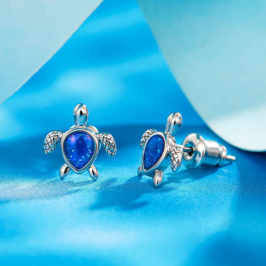 Huitan Blaue kleine Schildkröten-Ohrstecker für Damen, schickes Tier-Accessoire für den Alltag, zierlicher silberfarbener Schmuck für Damen