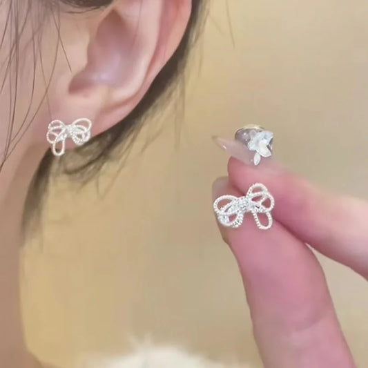 S925 Sterling Silber Aushöhlen Unregelmäßigen Bogen Schmetterling Krawatte Stud Ohrringe für Frauen Edlen Schmuck Hohe Luxus Vintage Zubehör
