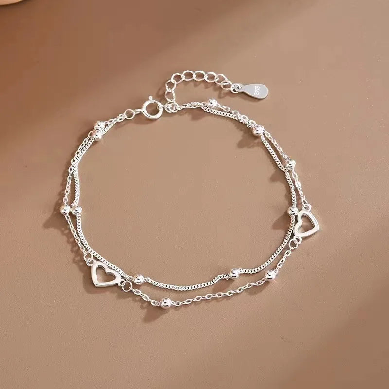 Silbernes doppellagiges Liebesherz-Armband mit hohlen runden Perlen für Frauen und Mädchen, modischer romantischer Schmuck, klassische verstellbare Geschenke