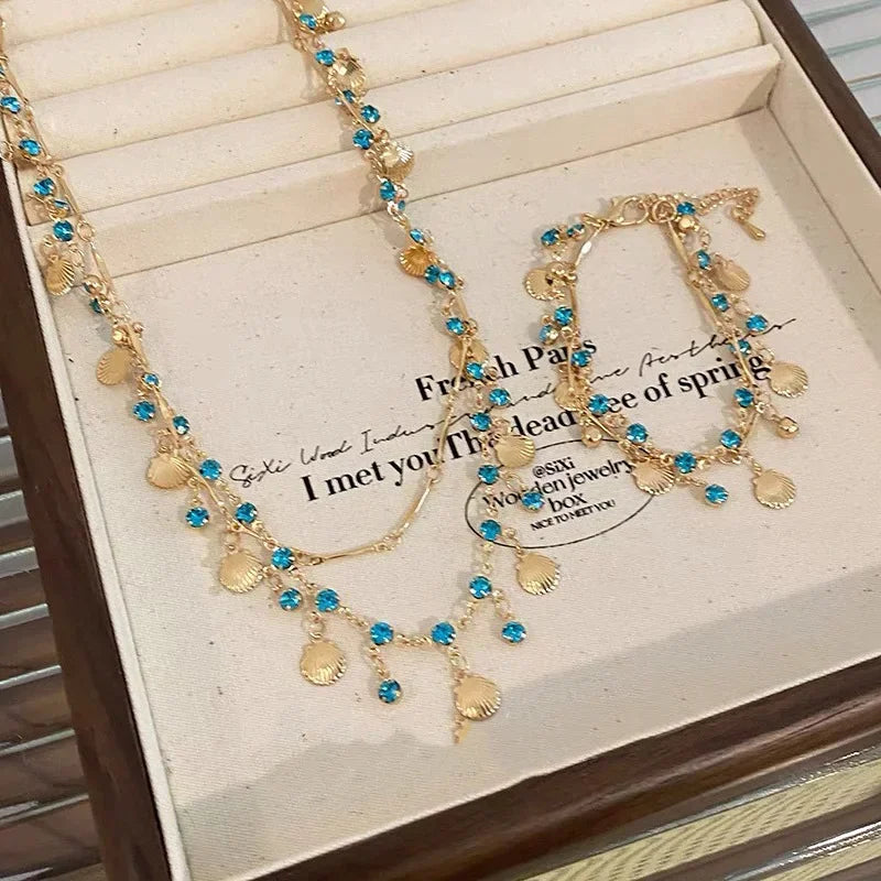 Elegante Gold Farbe Kette Shell Blau Schmuck Set Kristall Quasten Halsband Halskette Armband für Frauen Hochzeit Schmuck Geburtstag Geschenk
