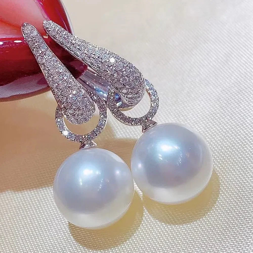 Huitan Mode Silber Farbe Kreuz Creolen für Frauen Voll kristall Zirkonia Aussage weibliche Ohrringe Trends Schmuck