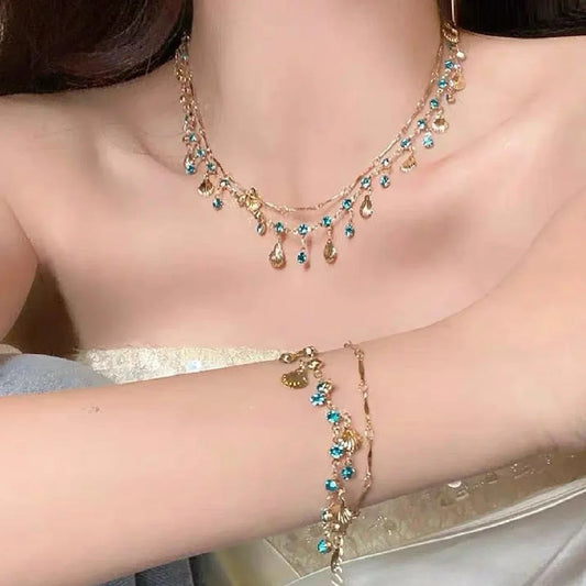 Elegante Gold Farbe Kette Shell Blau Schmuck Set Kristall Quasten Halsband Halskette Armband für Frauen Hochzeit Schmuck Geburtstag Geschenk