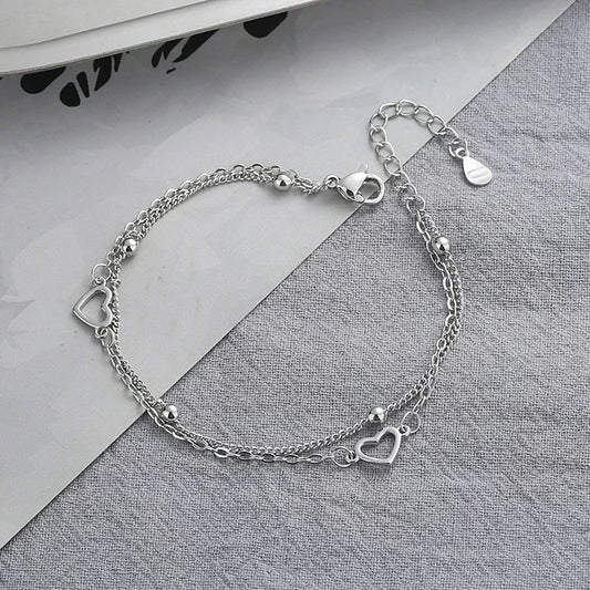 Armband aus 925er-Sterlingsilber, doppeltes Liebesherz, hohle runde Perlen, weibliche Mode, romantischer Schmuck, neue klassische verstellbare Geschenke
