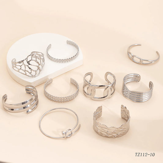 CARLIDANA Minimalistisches, hochwertiges neues Design, PVD-Silberfarbe, Edelstahl, modische Manschette, hohle Armreifen, Armband für Frauen