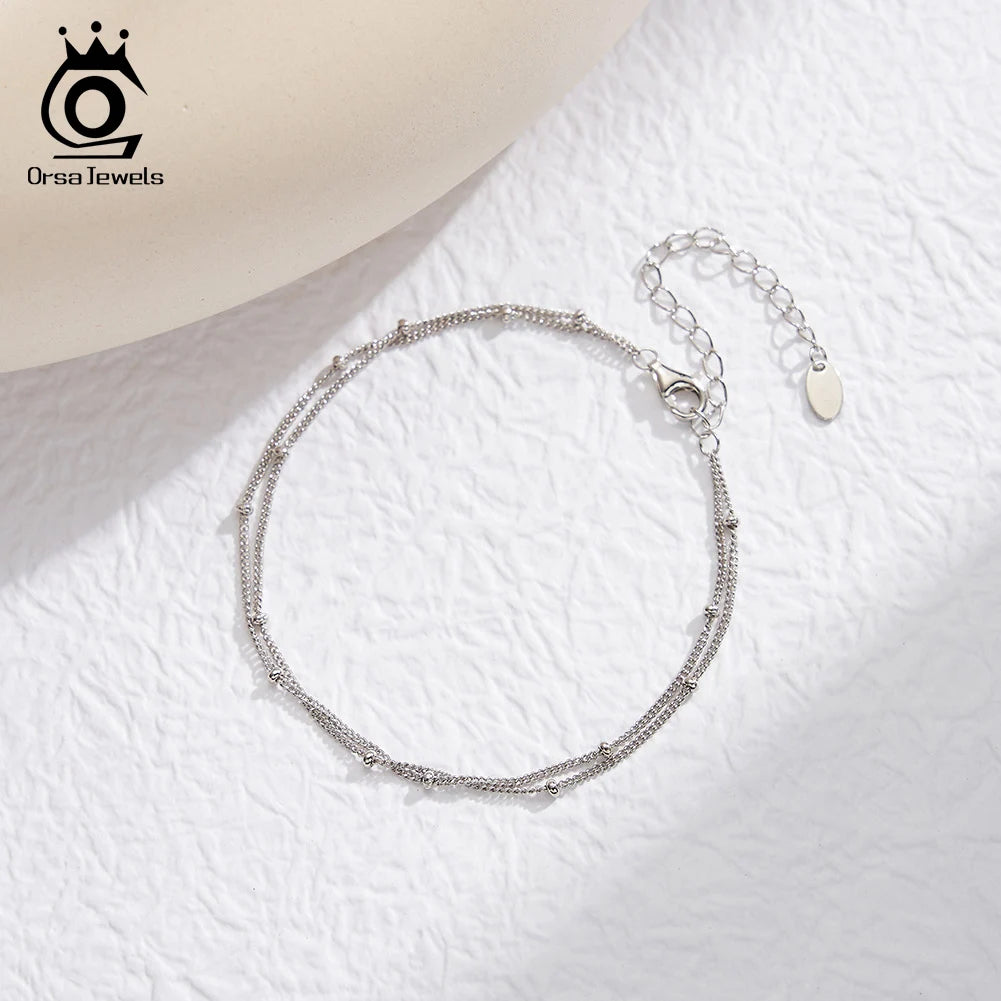 ORSA JEWELS Trendiges Doppelschichten-Armband mit kleinen runden Perlen, Damen-Handarmband, 925er Silberkette, einfaches Kugelarmband SB198